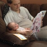 Bryan reading a cooking article from Southern Living to Sarah Amelia